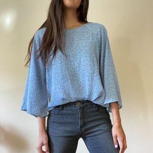 Patterned light blue blouse
